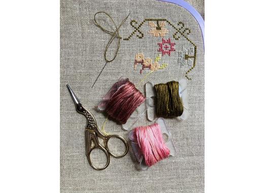 Embroidery sampler and scissors 